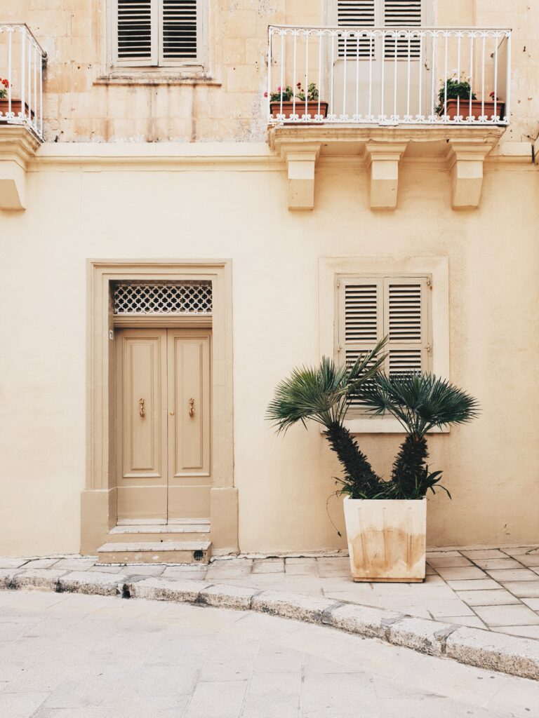 A doorway in Malta, one of the best honeymoon destinations in December.