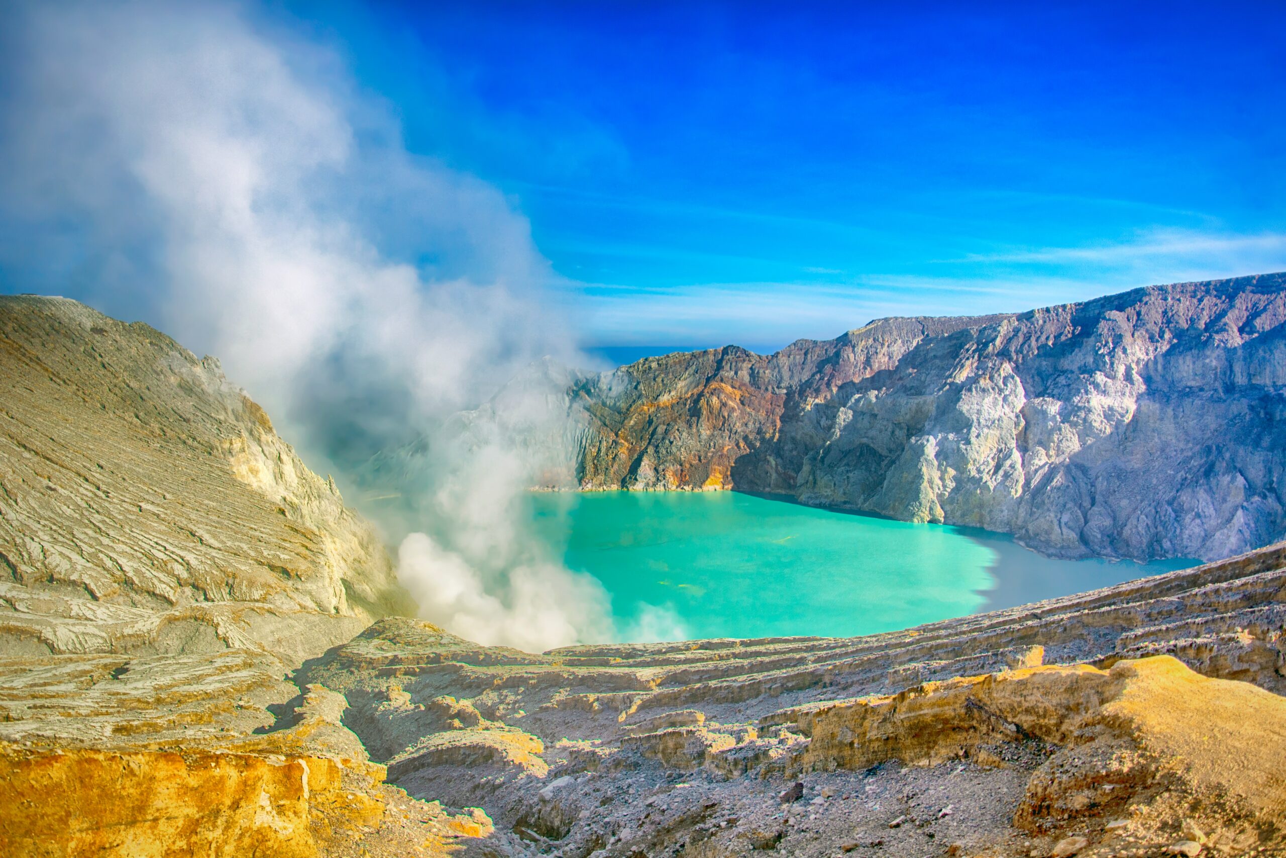 An Indonesian volcano called "Kawah Ijen" releases gasses.